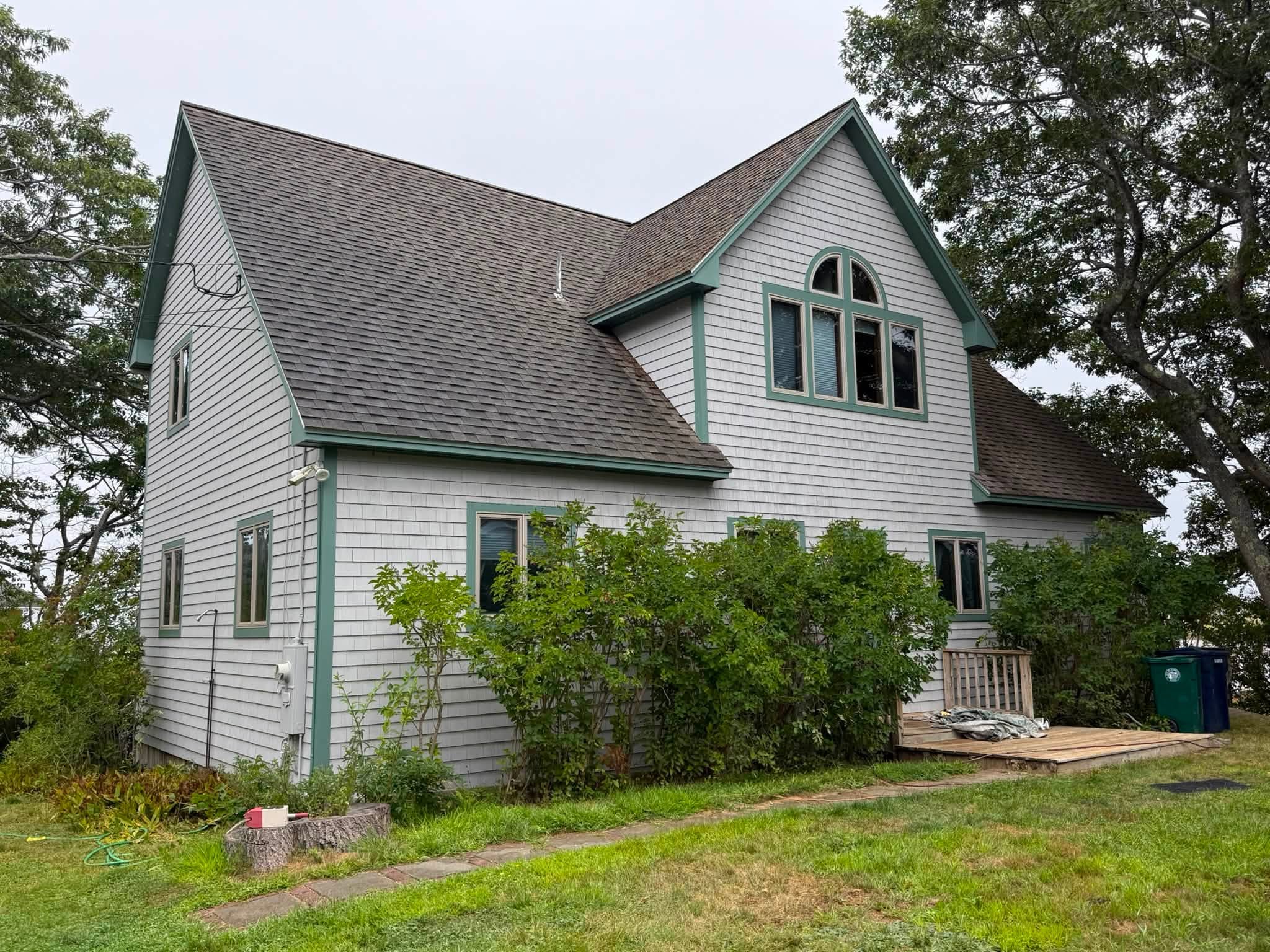 Coastal Exterior Transformation — Body, Trim, Deck & Doors — photo 1