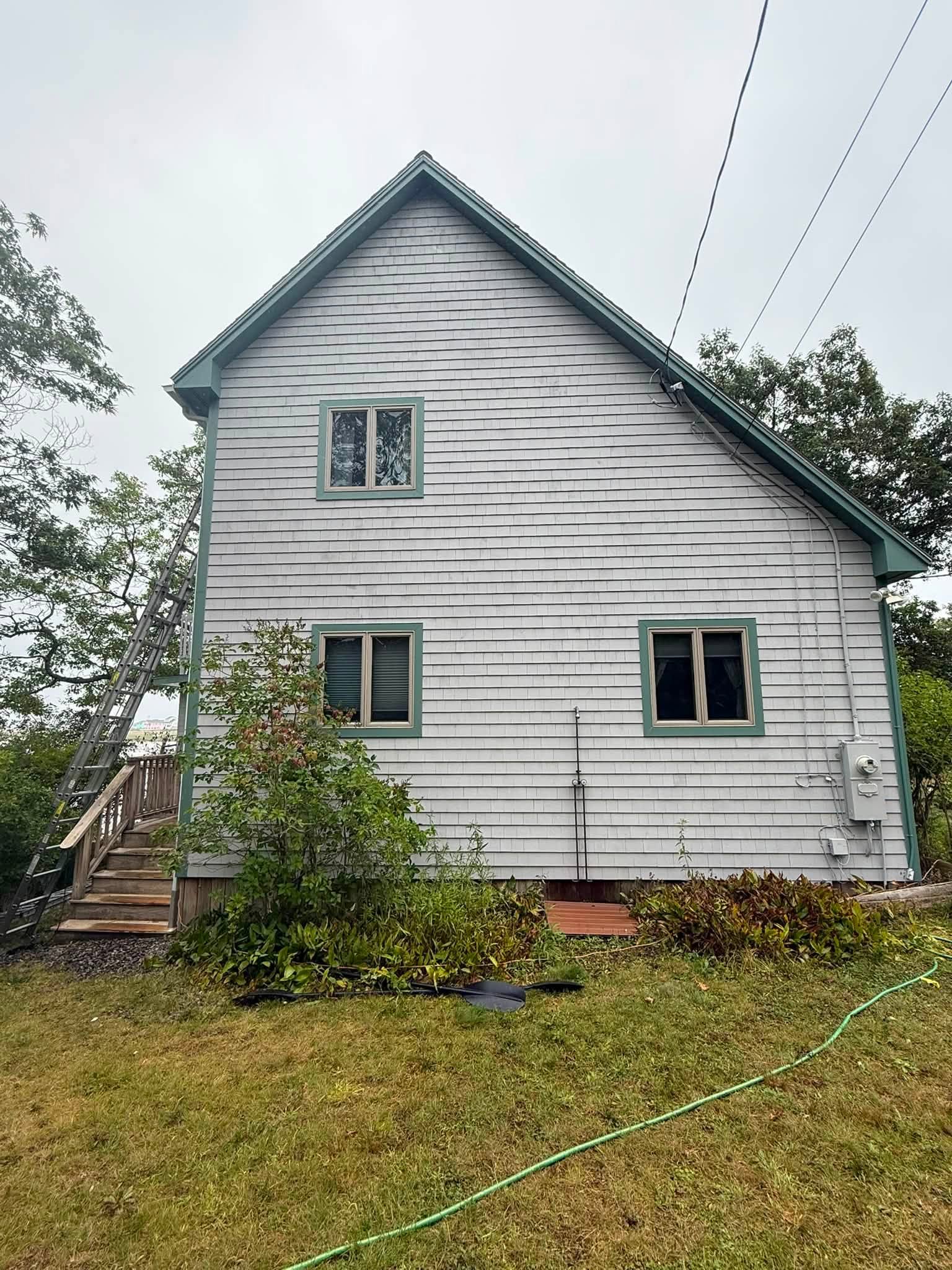 Coastal Exterior Transformation — Body, Trim, Deck & Doors — photo 2