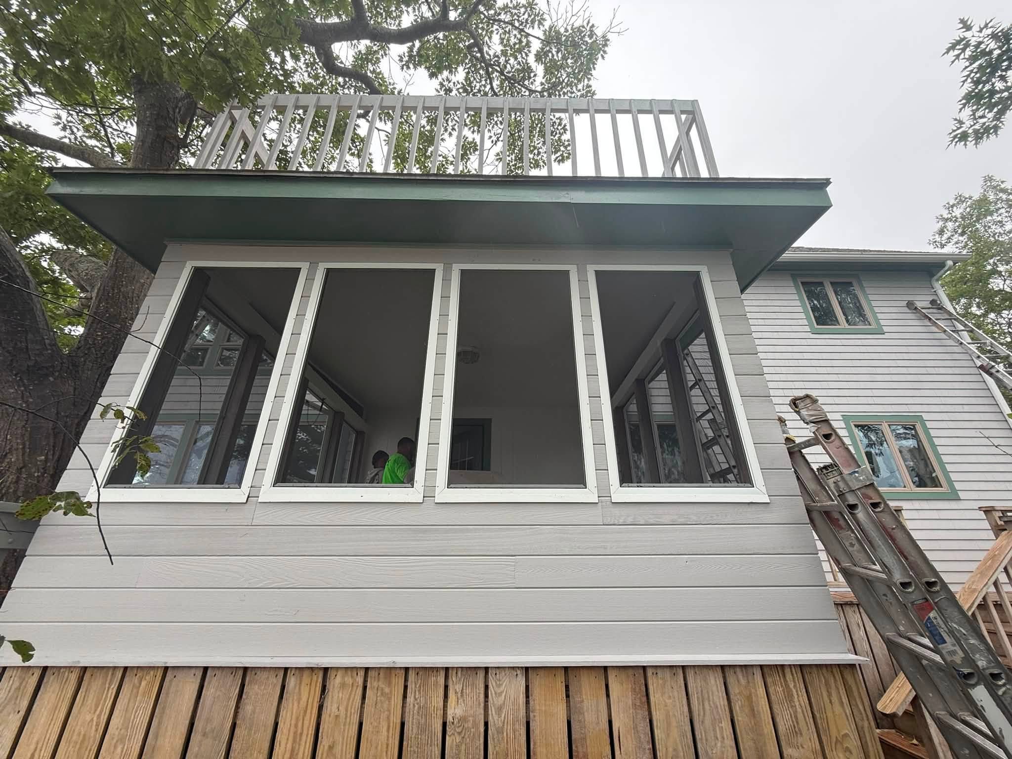 Coastal Exterior Transformation — Body, Trim, Deck & Doors — photo 3