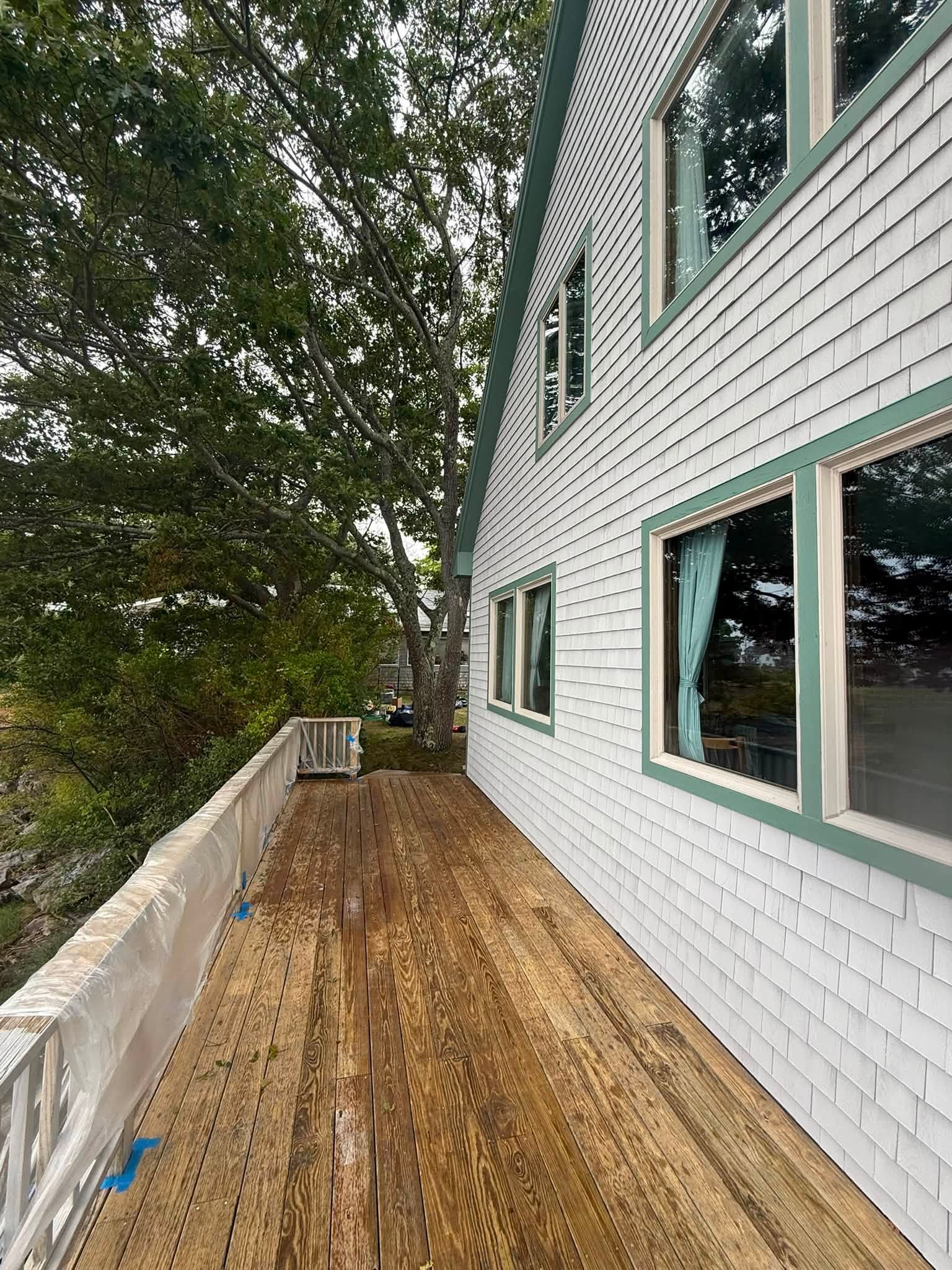 Coastal Exterior Transformation — Body, Trim, Deck & Doors — photo 6