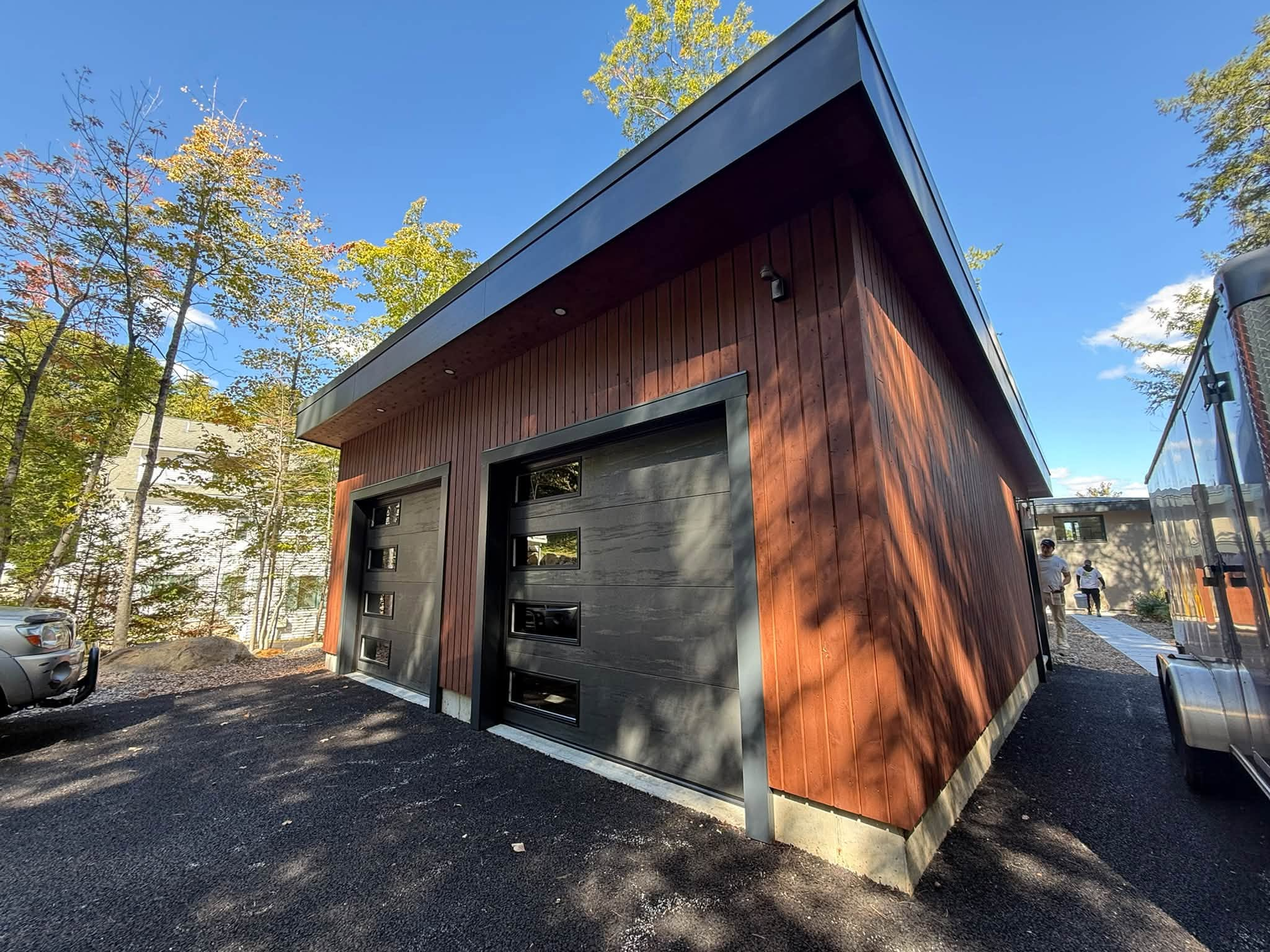 Lakes Region Exterior Repaint — Semi-Transparent Stain & Trim — photo 1