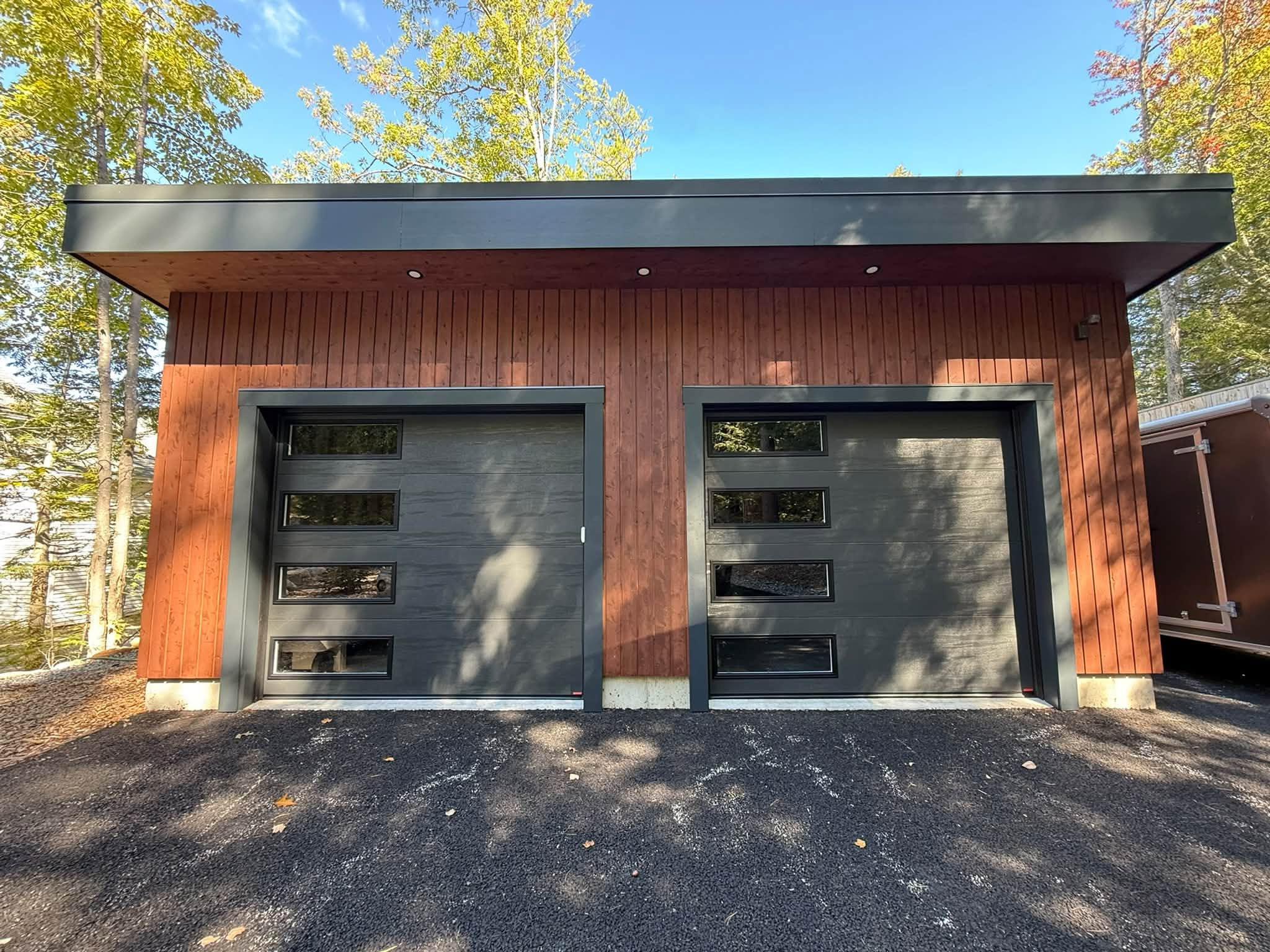Lakes Region Exterior Repaint — Semi-Transparent Stain & Trim — photo 2