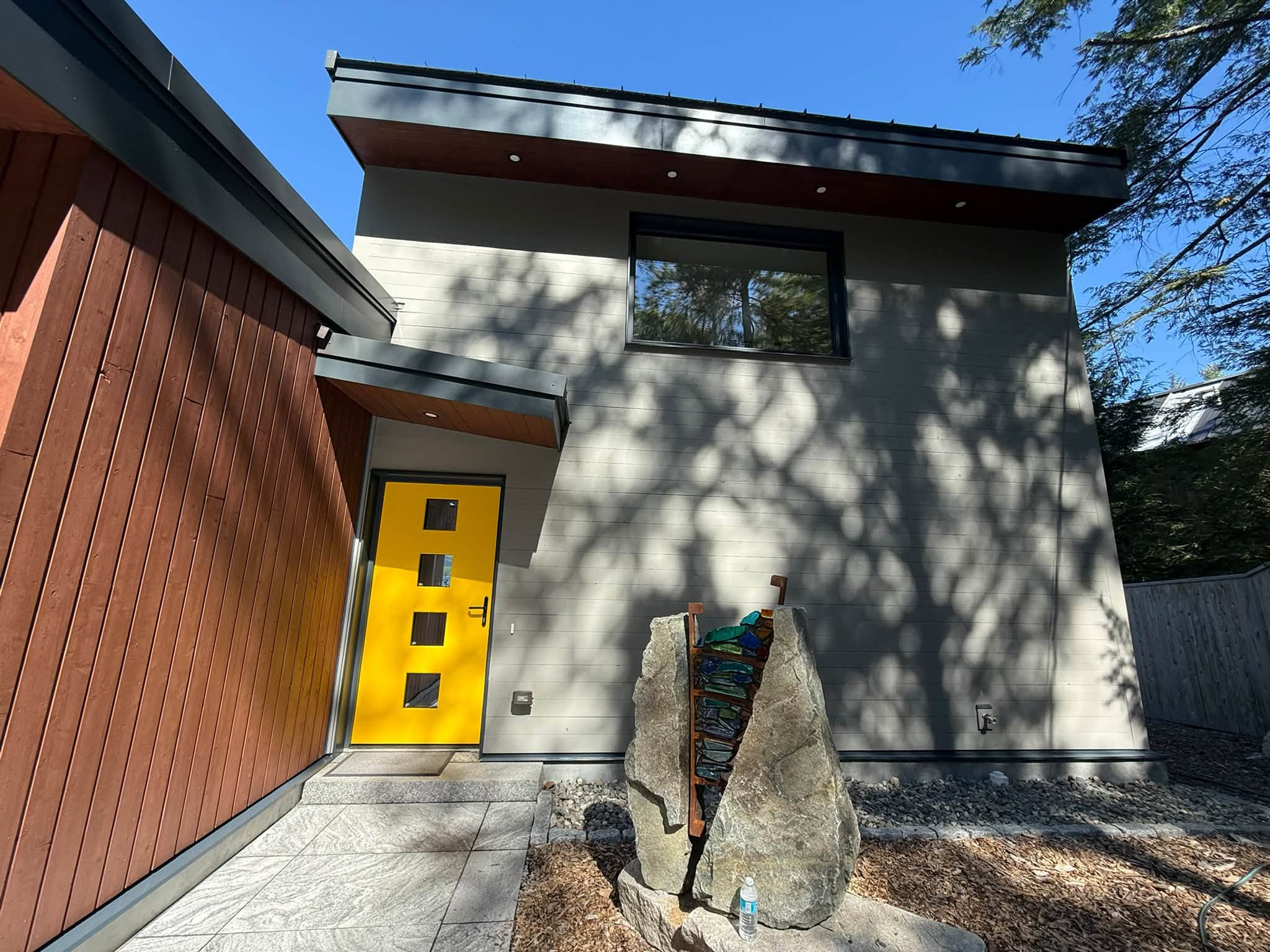 Lakes Region Exterior Repaint — Semi-Transparent Stain & Trim — photo 4