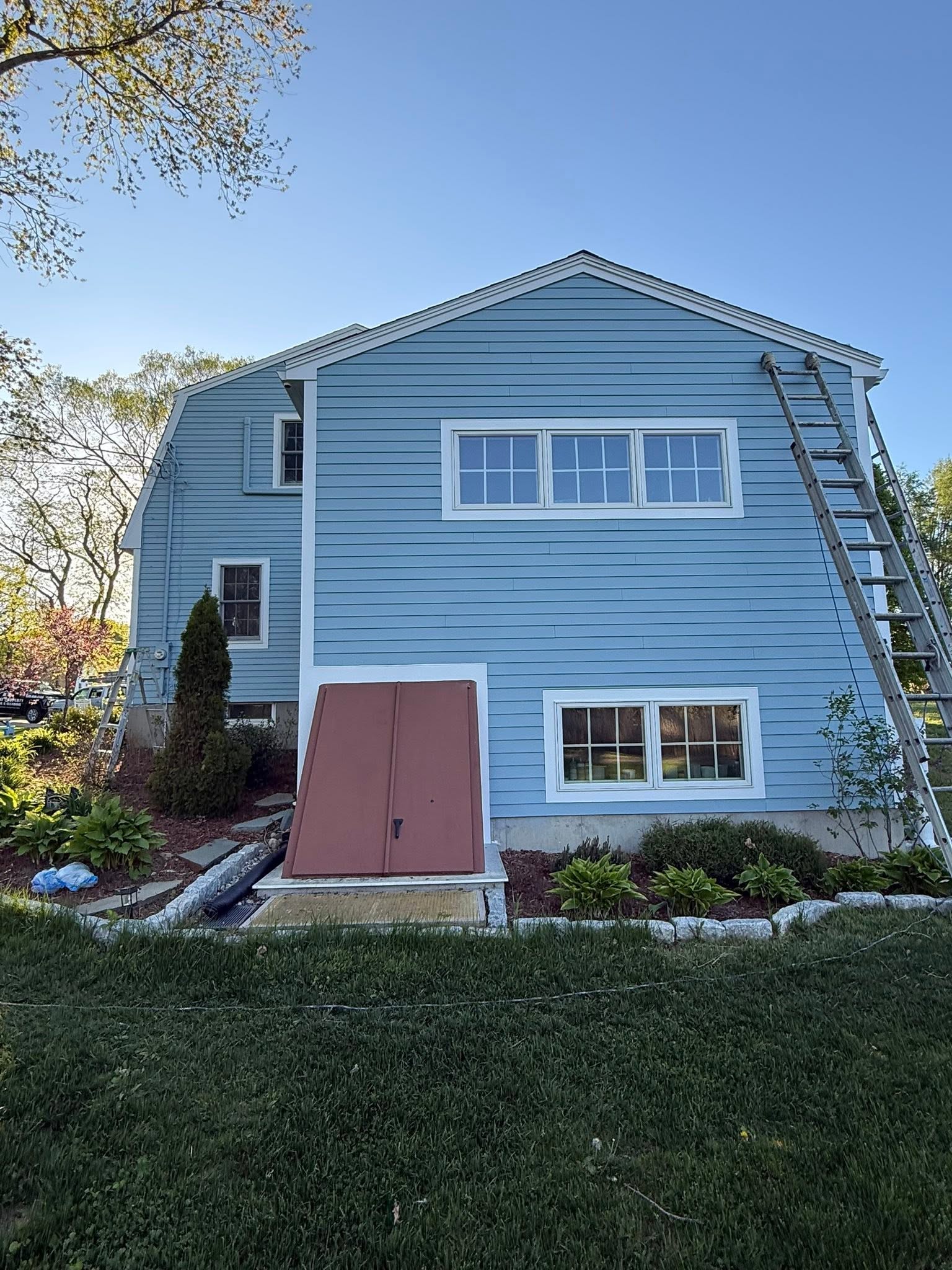 Exterior Stain & Trim Repaint with Carpentry — photo 1