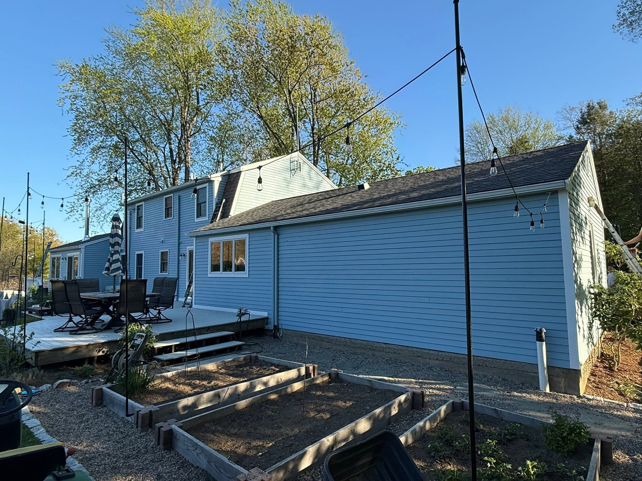 Exterior Stain & Trim Repaint with Carpentry — photo 6