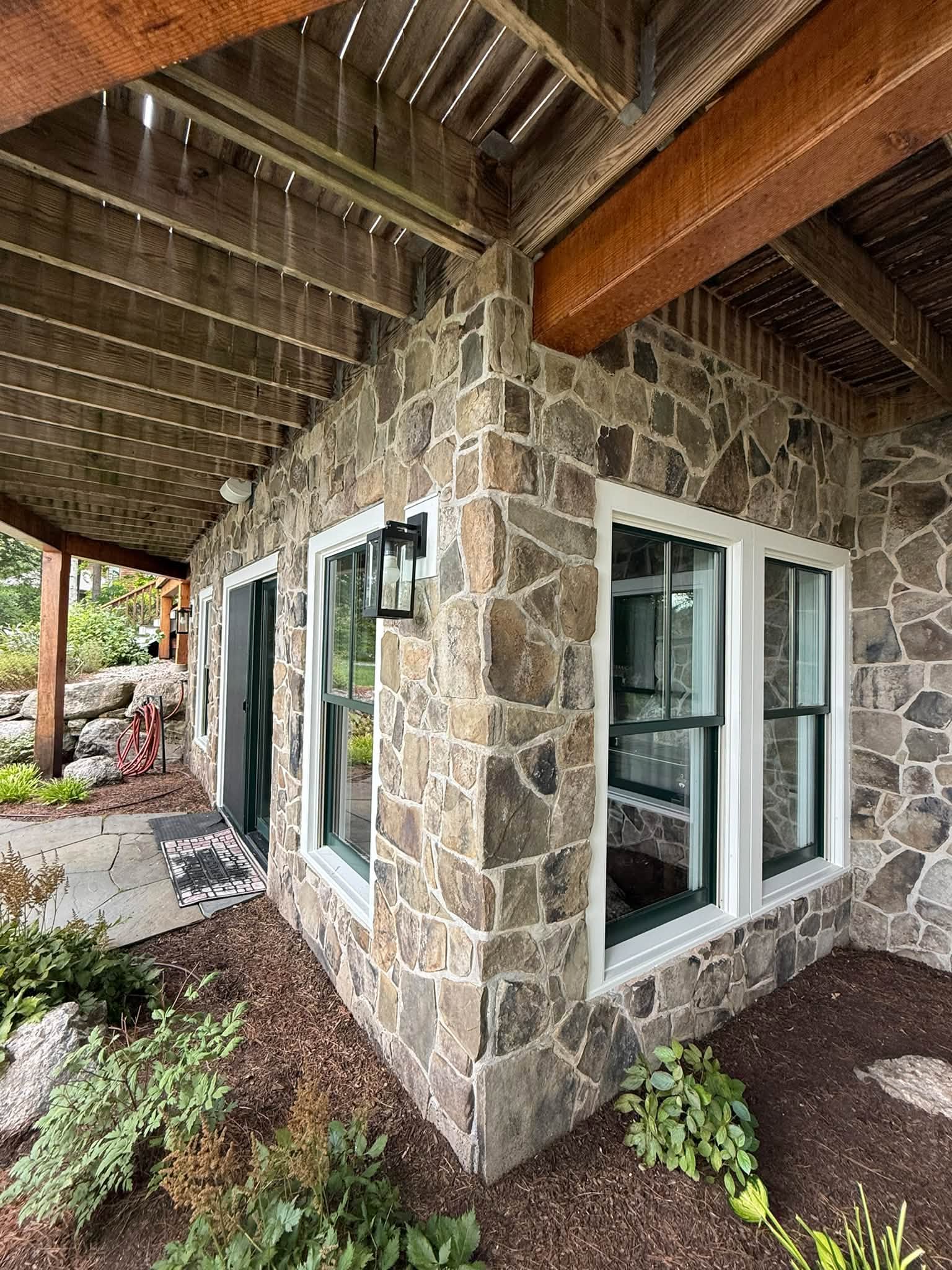 Lakefront Cedar Shingle Restoration — Walnut Stain, Trim & Railings — photo 1