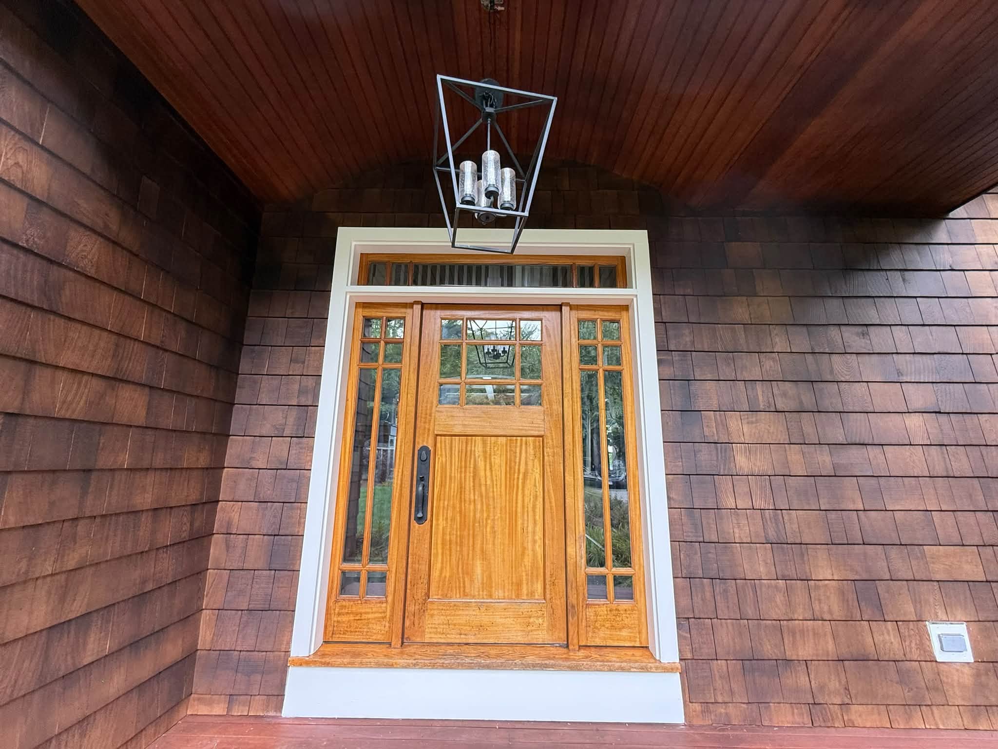 Lakefront Cedar Shingle Restoration — Walnut Stain, Trim & Railings — photo 7