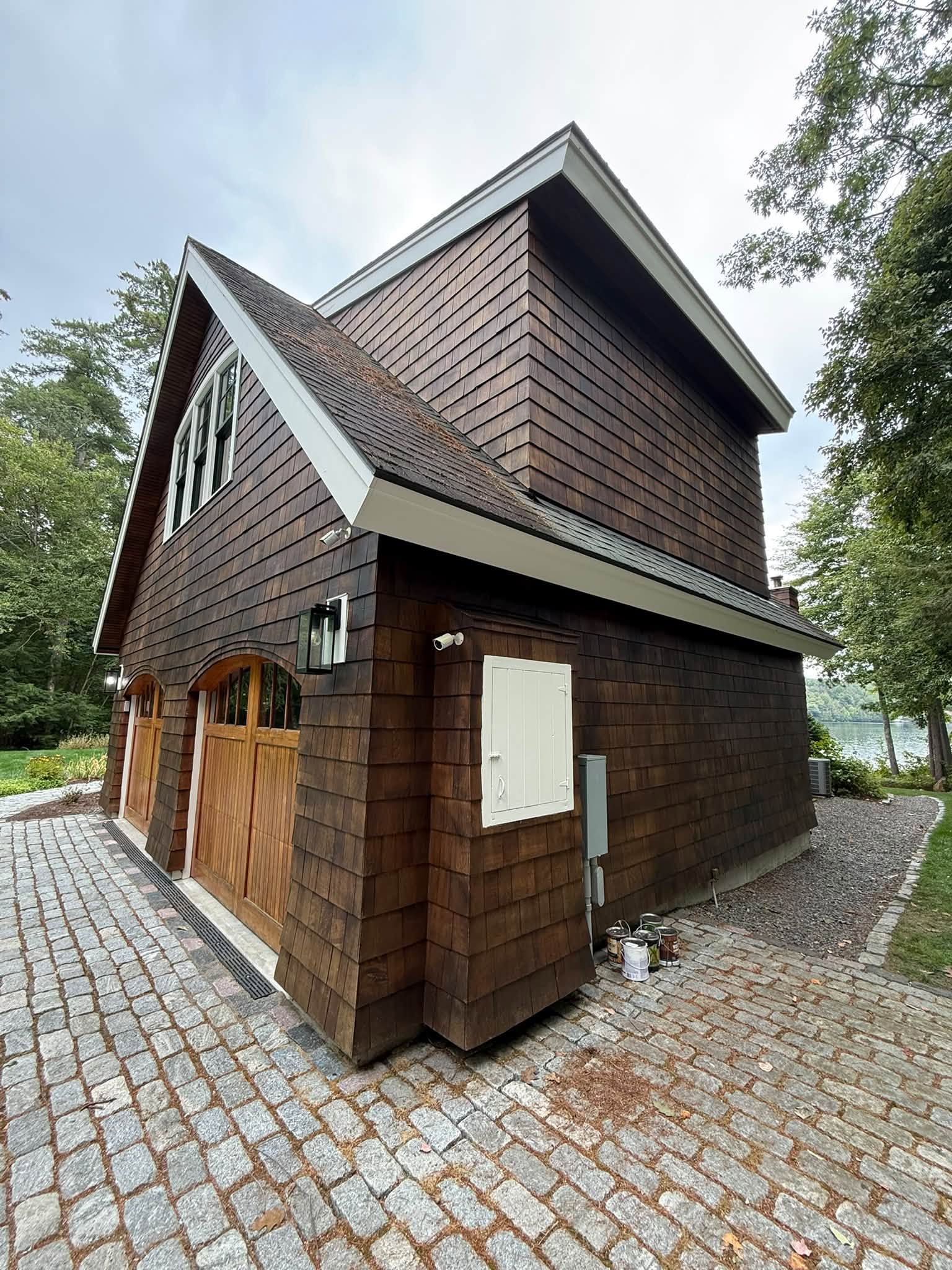 Lakefront Cedar Shingle Restoration — Walnut Stain, Trim & Railings — photo 8
