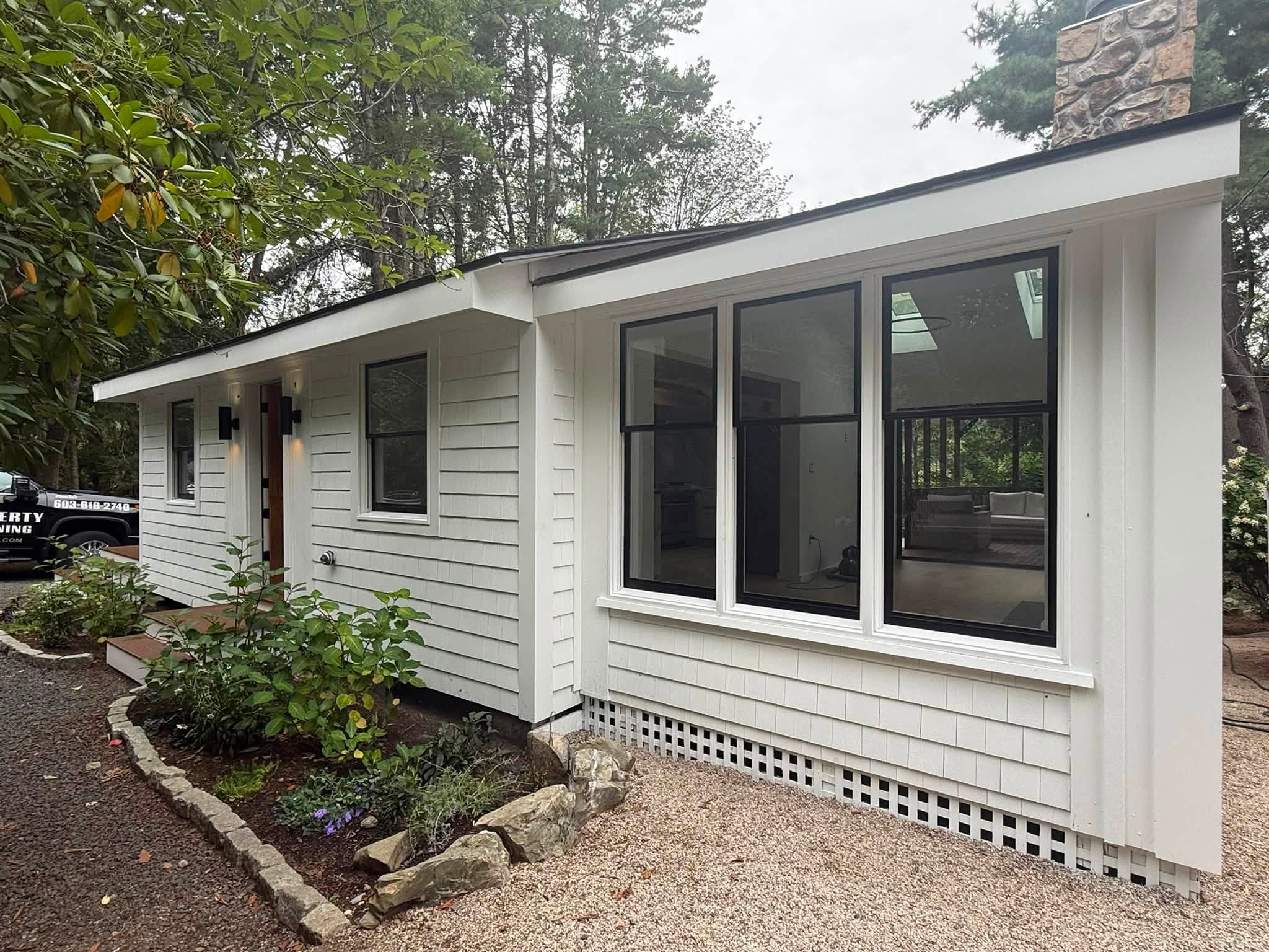 Complete Exterior Transformation — Black Windows, Front Door & Three-Season Room — photo 5